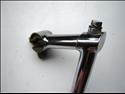 Titan Luxe (clamp bolt forward under bars)